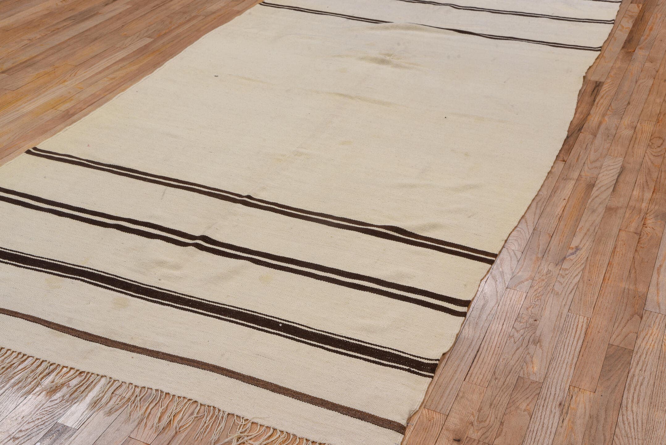 5' x 10' one-of-a-kind handmade vintage Blanket medium size rug. Color palette: ivory, brown, cream, taupe, beige, gray
