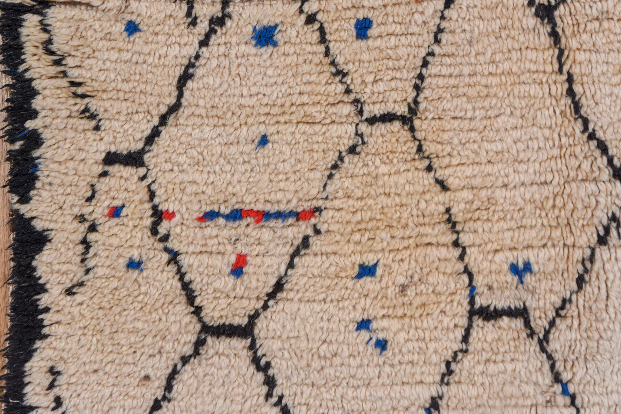 4' x 9' one-of-a-kind handmade vintage Moroccan runner rug. Color palette: ivory, charcoal, cobalt, crimson, gray, black