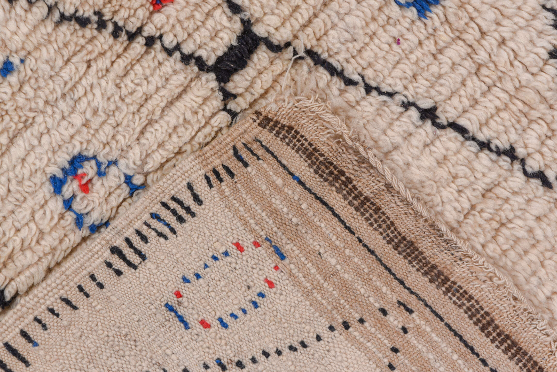 4' x 9' one-of-a-kind handmade vintage Moroccan runner rug. Color palette: ivory, charcoal, cobalt, crimson, gray, black