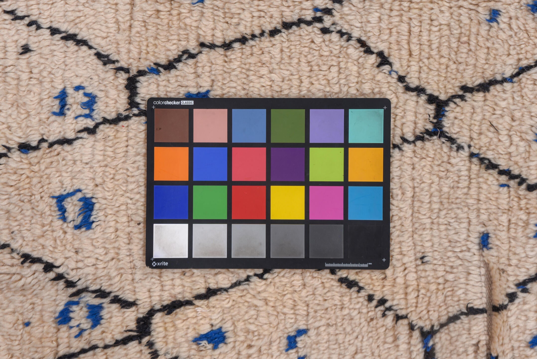 4' x 9' one-of-a-kind handmade vintage Moroccan runner rug. Color palette: ivory, charcoal, cobalt, crimson, gray, black