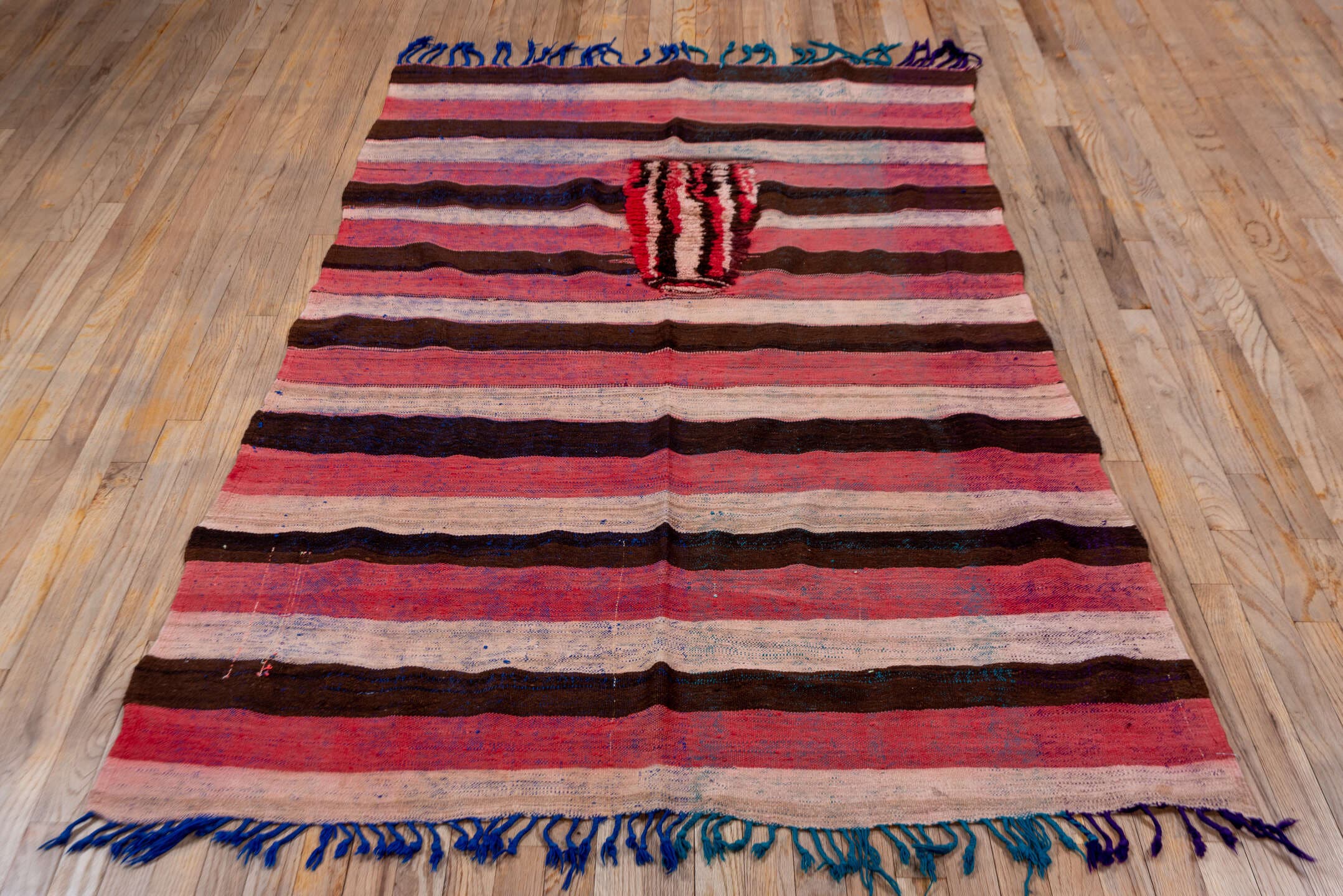 4' x 7' one-of-a-kind handmade vintage Moroccan rug. Color palette: rose, ivory, dark brown, burgundy, indigo, teal, pink