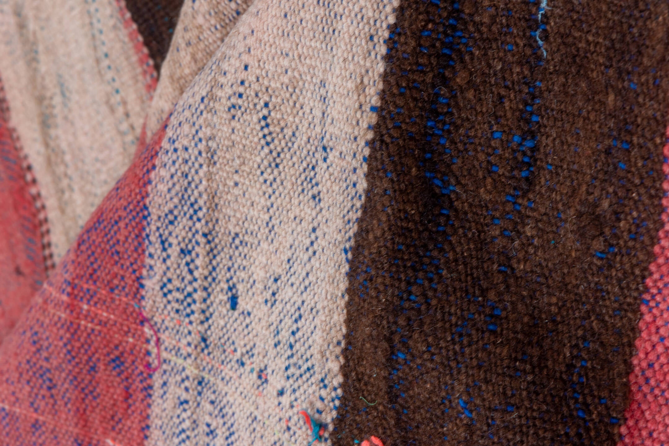 4' x 7' one-of-a-kind handmade vintage Moroccan rug. Color palette: black, blue, brown, gray, pink, red, wine