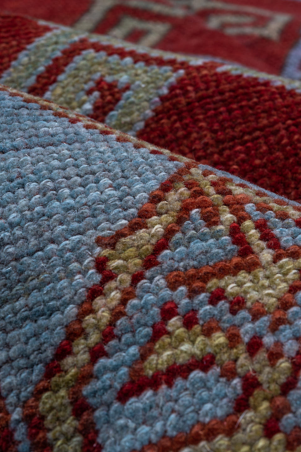 4' x 6' one-of-a-kind handmade vintage Caucasian small size rug. Color palette: red, ivory, sky blue, rust, burgundy, camel