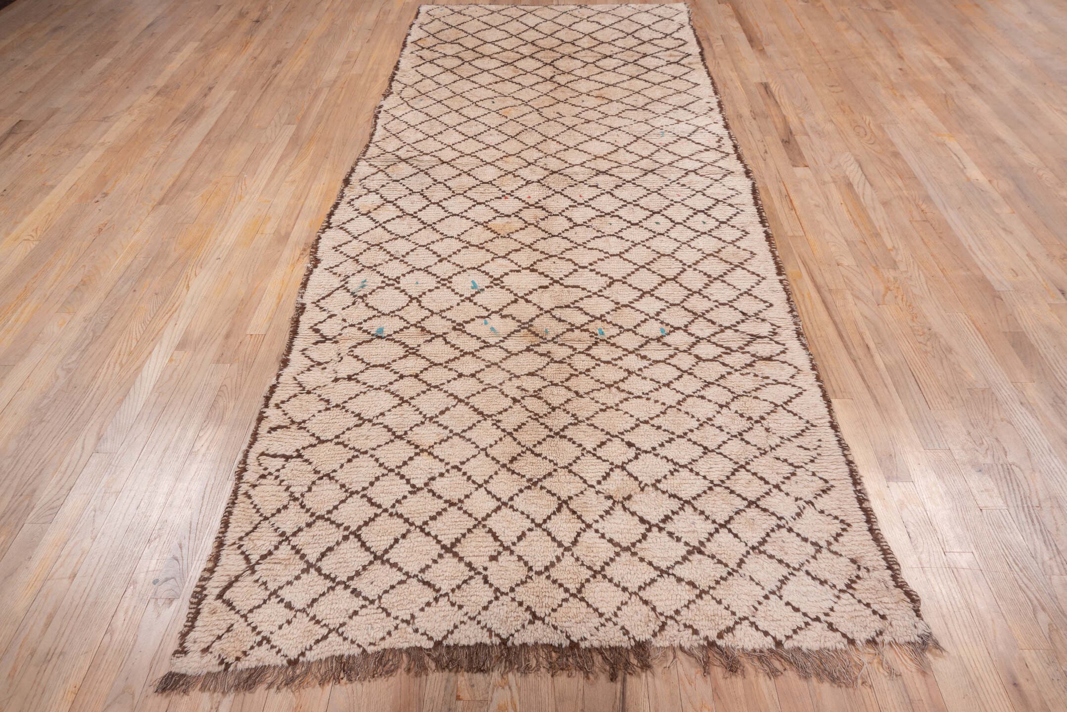 4' x 12' one-of-a-kind handmade vintage Moroccan runner rug. Color palette: ivory, brown, taupe, sky_blue, coral, beige