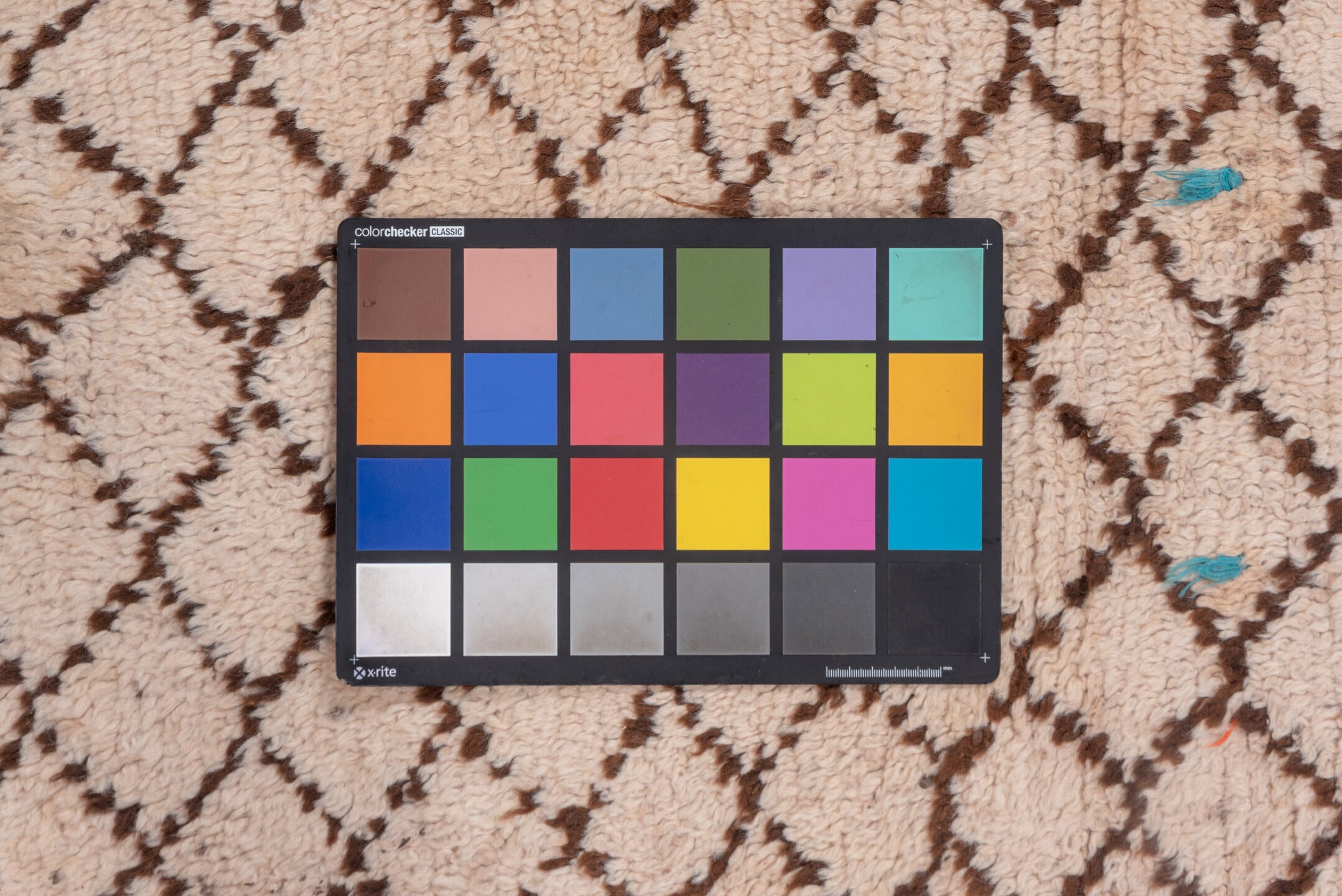 4' x 12' one-of-a-kind handmade vintage Moroccan runner rug. Color palette: brown, gray, light gray, off-white, orange, pink