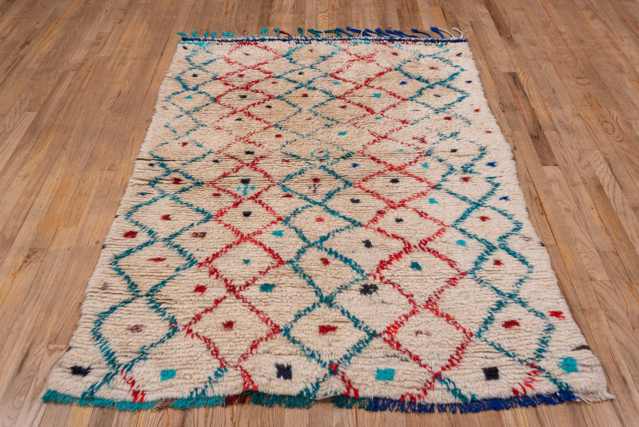 4' x 6' one-of-a-kind handmade vintage Moroccan small size rug. Color palette: ivory, turquoise, red, navy, black, teal