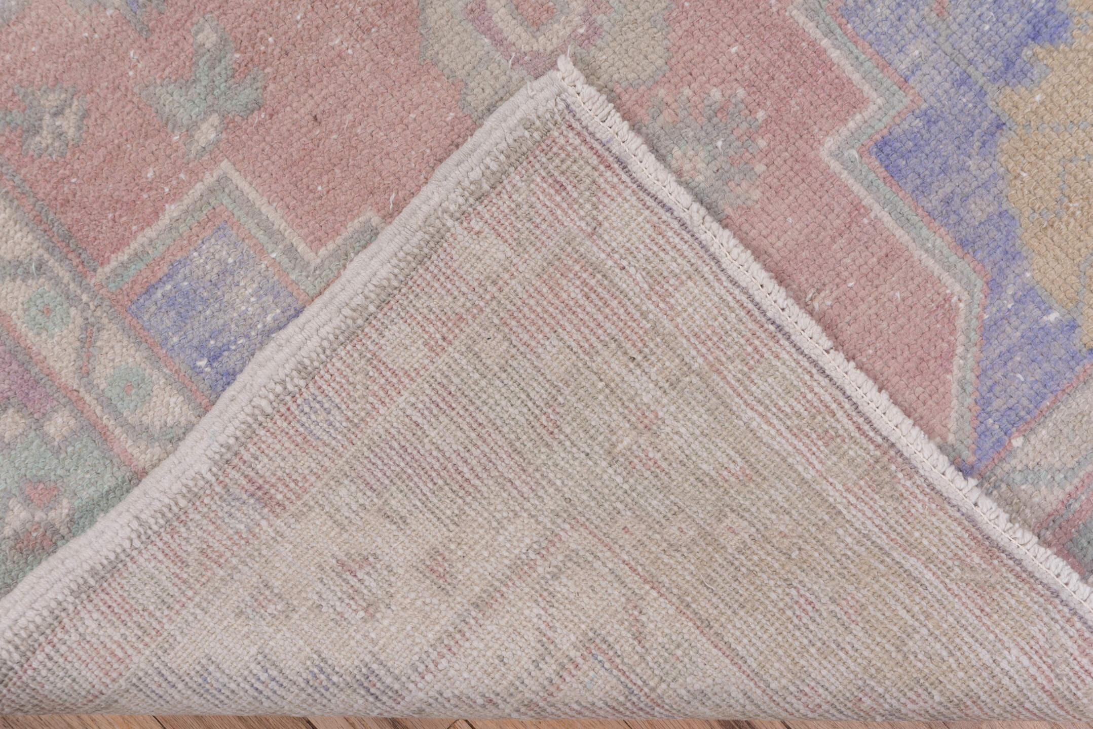 3' x 10' one-of-a-kind handmade vintage Oushak runner rug. Color palette: rose, taupe, ivory, lavender, sage, dusty blue
