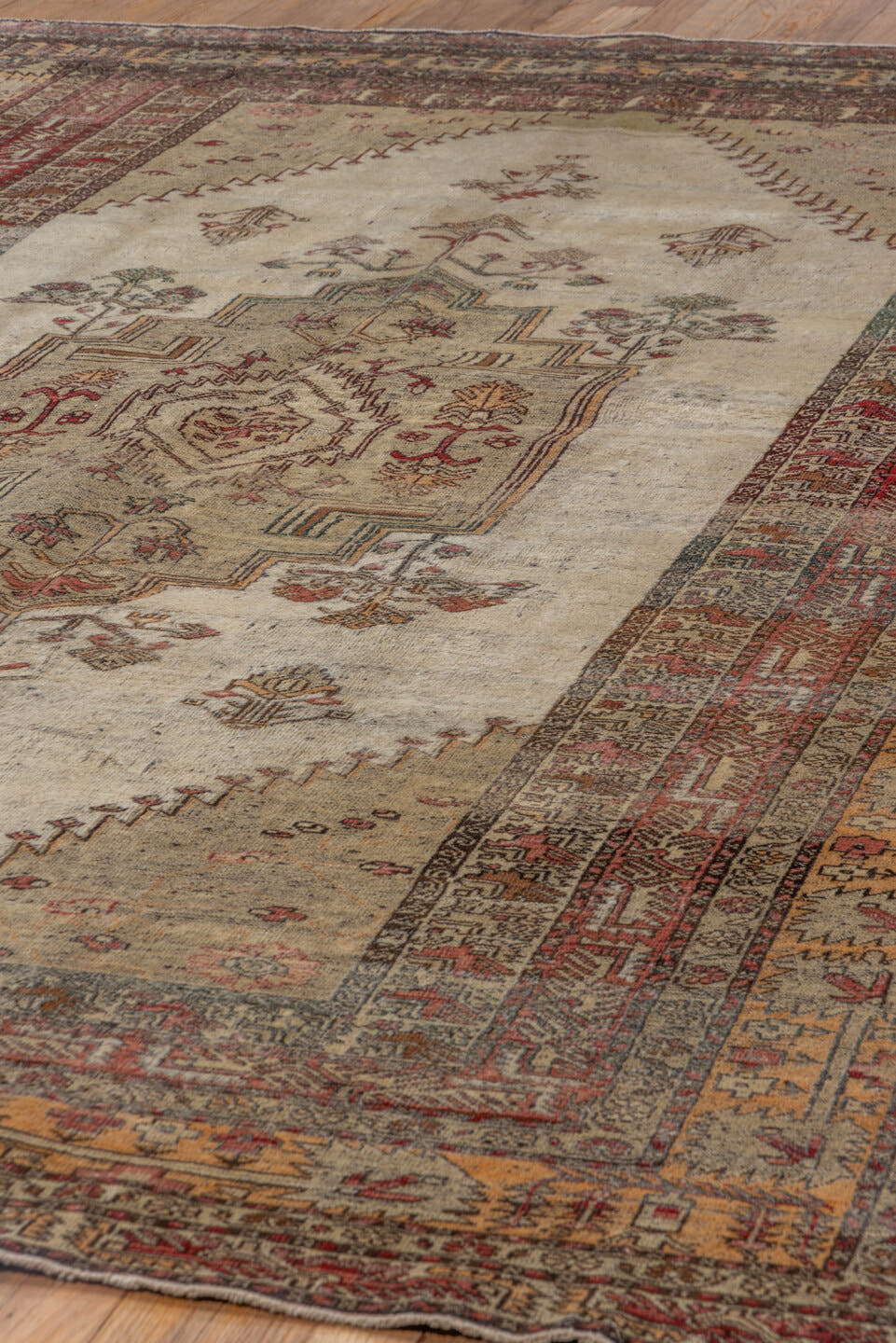 6' x 9' one-of-a-kind handmade vintage Oushak medium size rug. Color palette: ivory, rust, burgundy, taupe, gold, brown