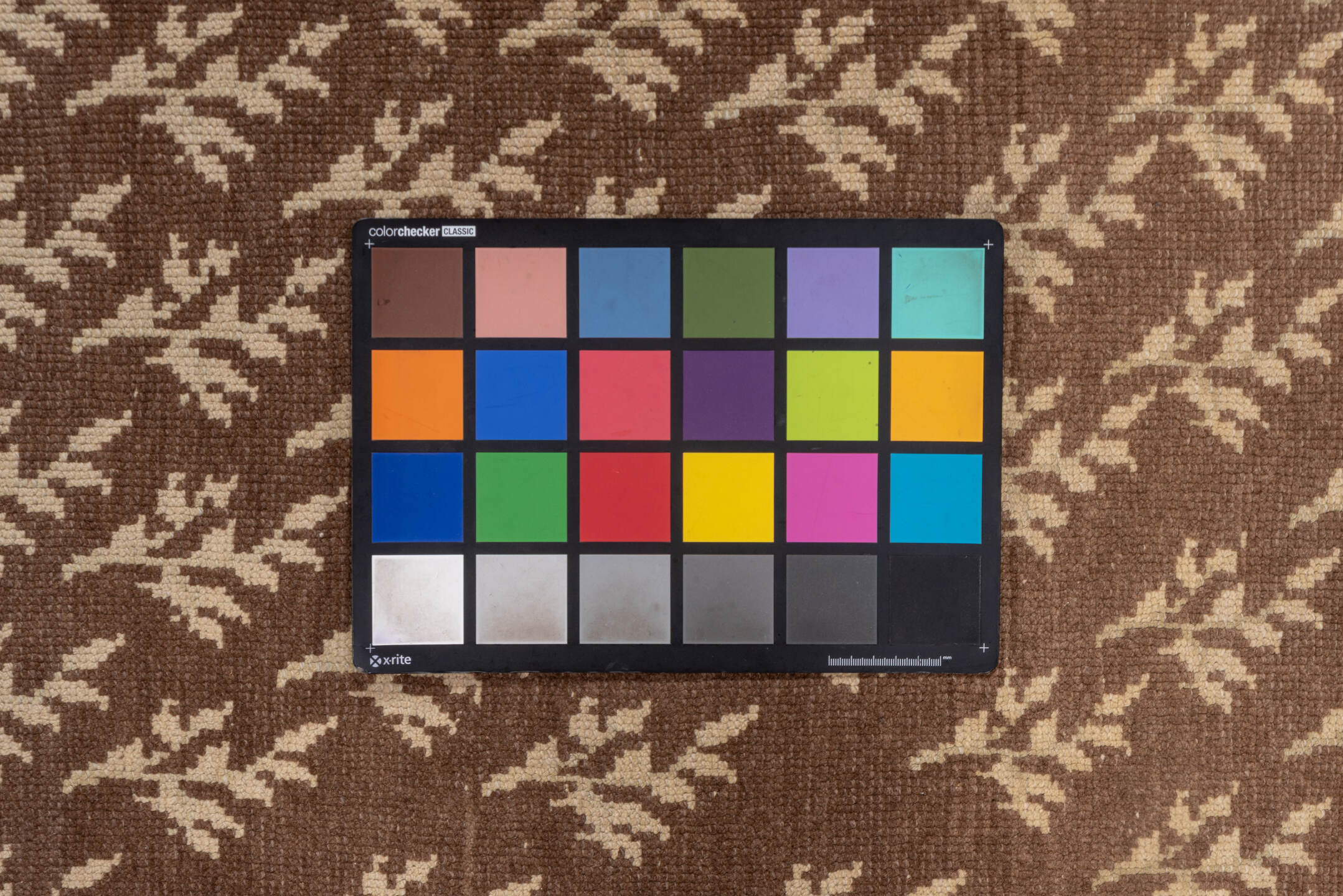 3' x 4' one-of-a-kind handmade vintage Tulu small size rug. Color palette: brown, gray, light gray, off-white, orange, pink