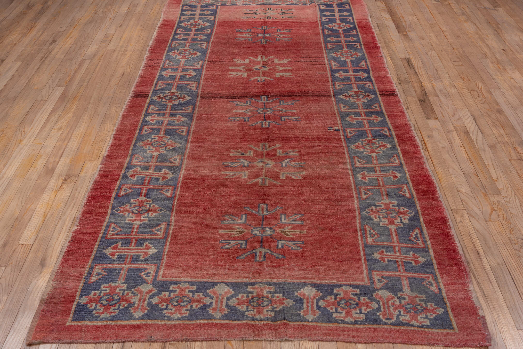4' x 10' one-of-a-kind handmade vintage Oushak runner rug. Color palette: blue, brown, gray, pink, red
