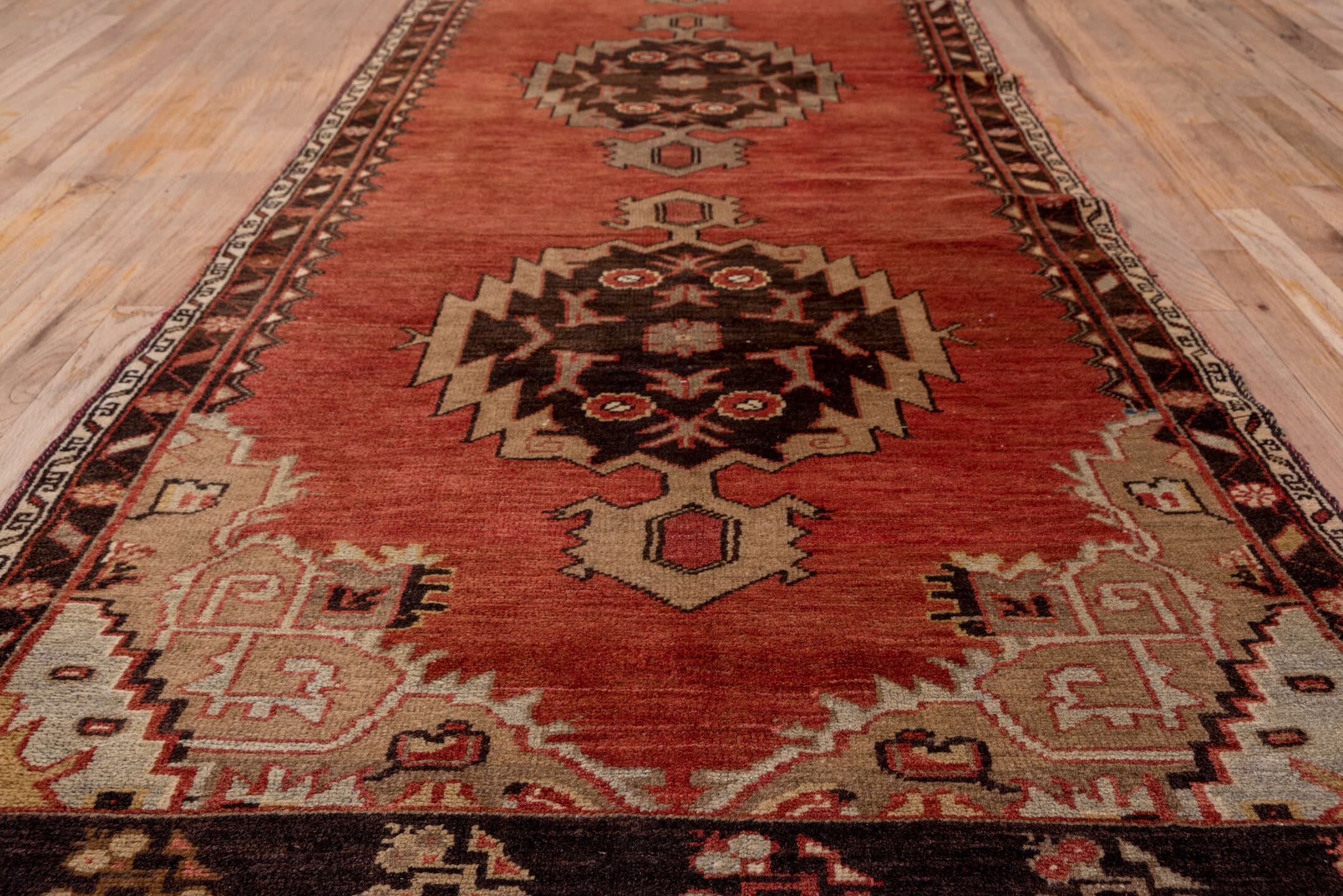 3' x 10' one-of-a-kind handmade vintage Oushak runner rug. Color palette: terra cotta, rust, ivory, taupe, charcoal, rose