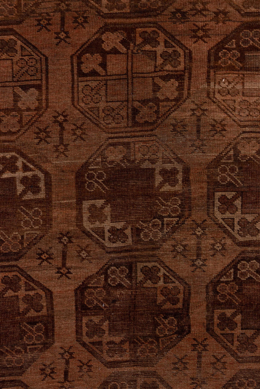 4' x 7' one-of-a-kind handmade antique Afghan rug. Color palette: brown, rust, camel, mahogany, taupe, terra cotta, charcoal