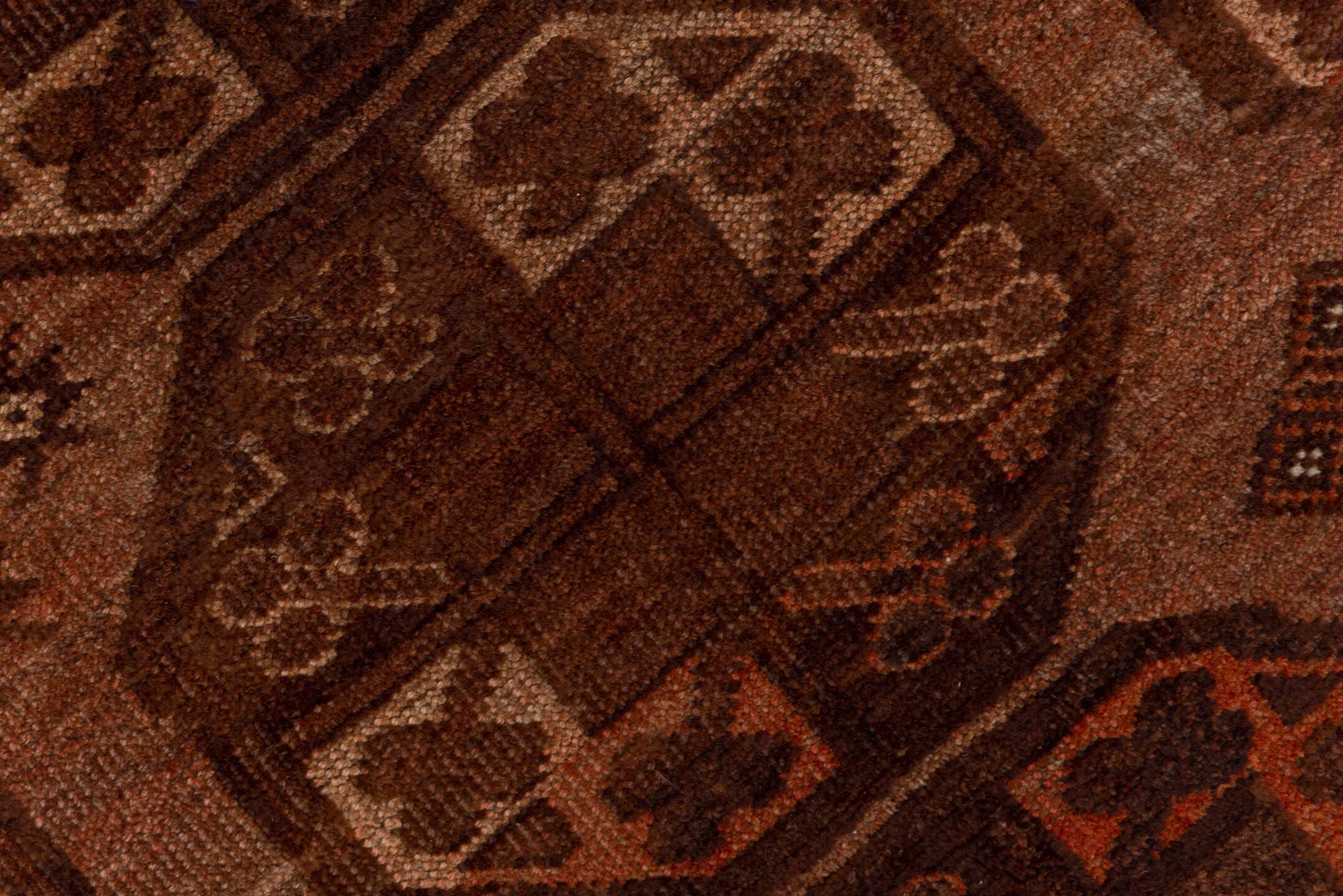 4' x 7' one-of-a-kind handmade antique Afghan rug. Color palette: brown, rust, camel, mahogany, taupe, terra cotta, charcoal