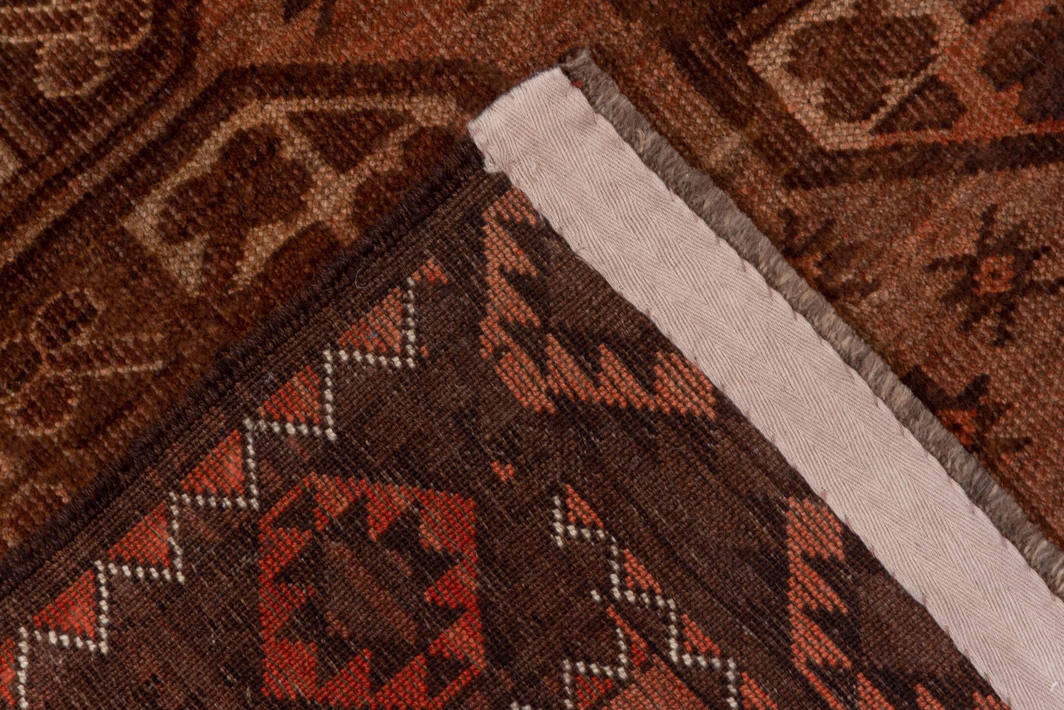 4' x 7' one-of-a-kind handmade antique Afghan rug. Color palette: brown, rust, camel, mahogany, taupe, terra cotta, charcoal