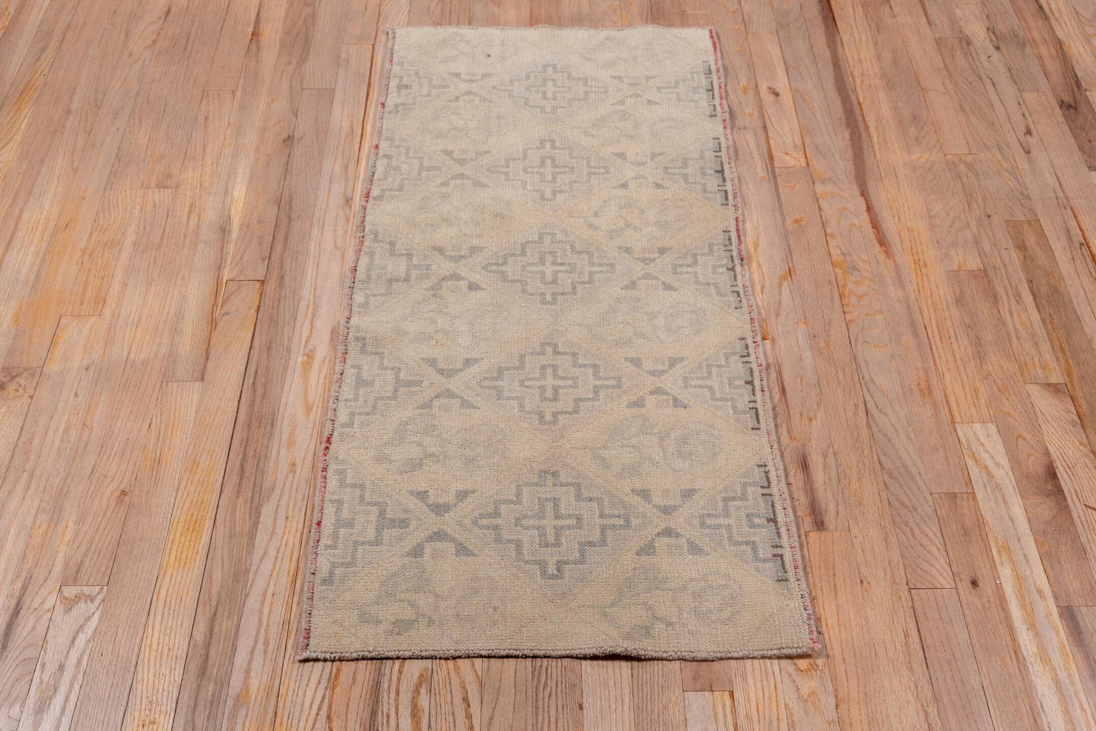 2' x 4' one-of-a-kind handmade vintage Oushak small size rug. Color palette: taupe, beige, camel, gray, rose, pink, red