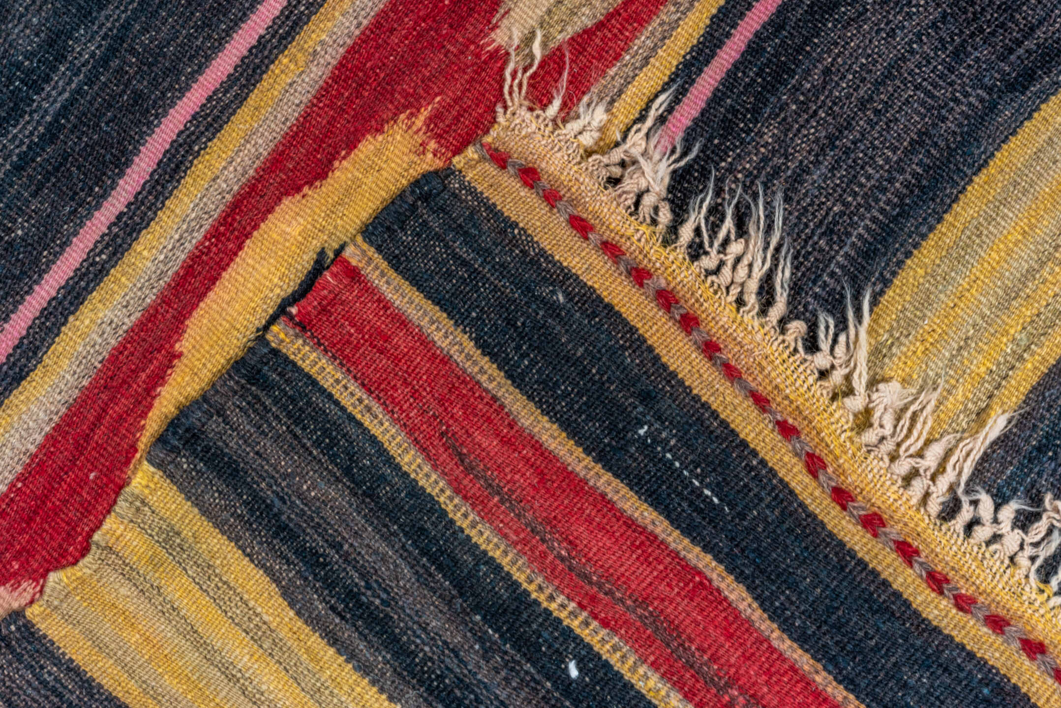 4' x 11' one-of-a-kind handmade vintage Kilim runner rug. Color palette: charcoal, rust, camel, rose, taupe, burgundy, gray