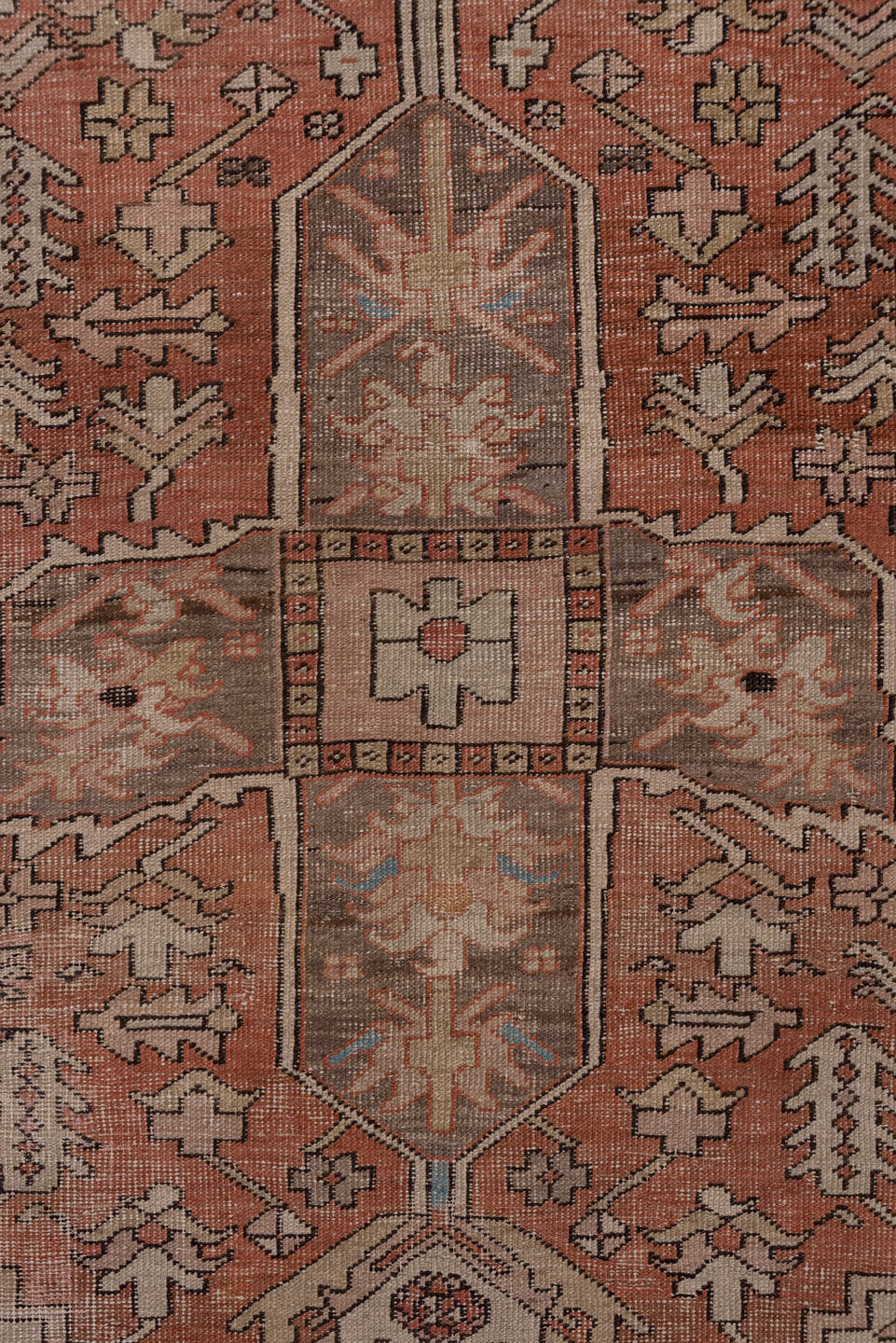 4' x 5' one-of-a-kind handmade antique Serapi small size rug. Color palette: terra cotta, taupe, brown, ivory, camel, slate