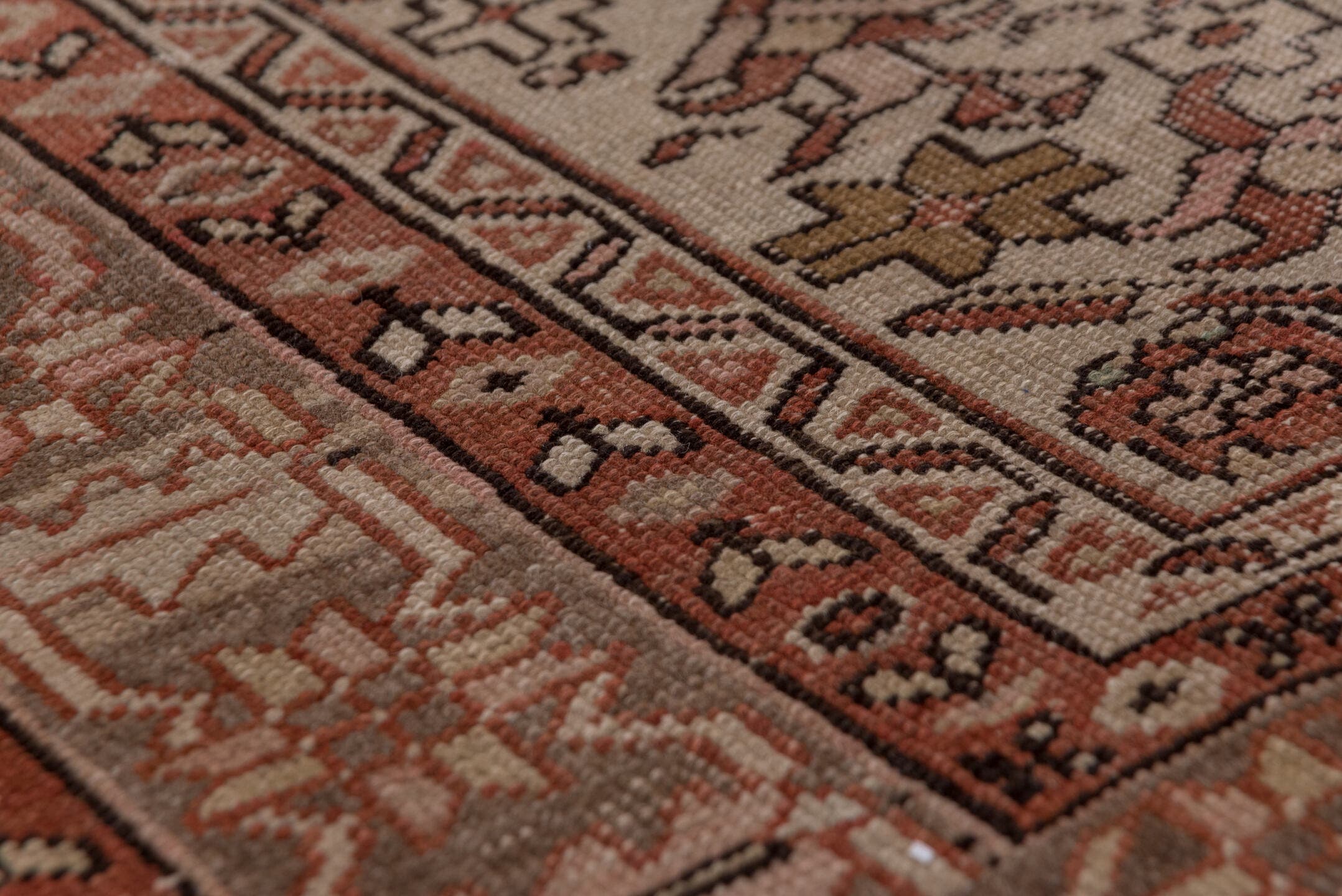4' x 5' one-of-a-kind handmade antique Serapi small size rug. Color palette: terra cotta, taupe, brown, ivory, camel, slate