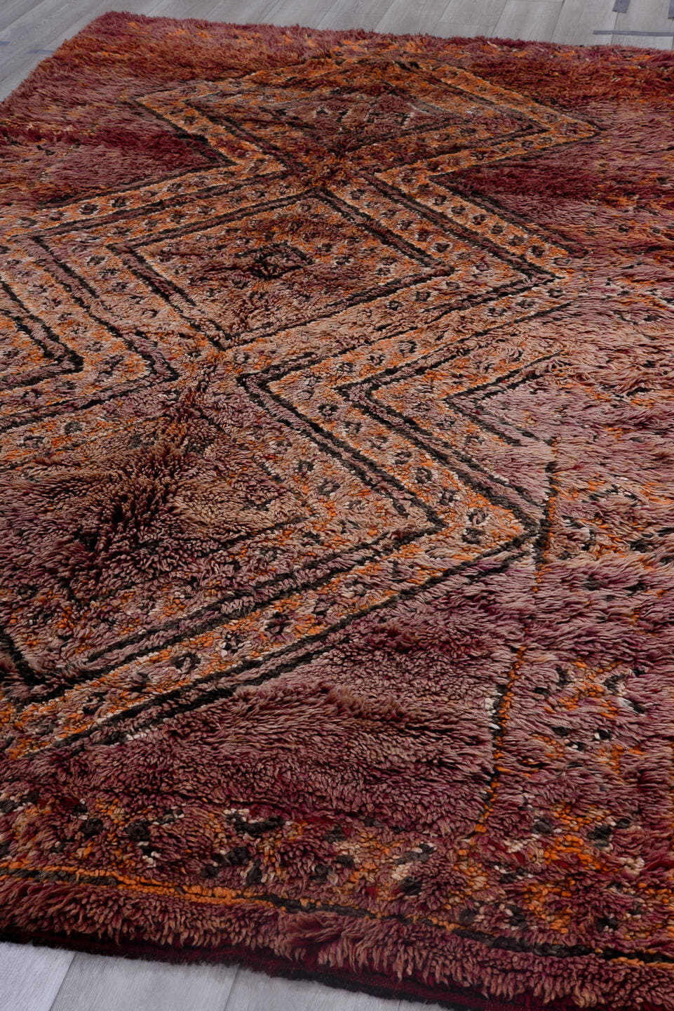 6' x 12' one-of-a-kind handmade antique Moroccan large size rug. Color palette: rose, mauve, plum, charcoal, rust, saffron