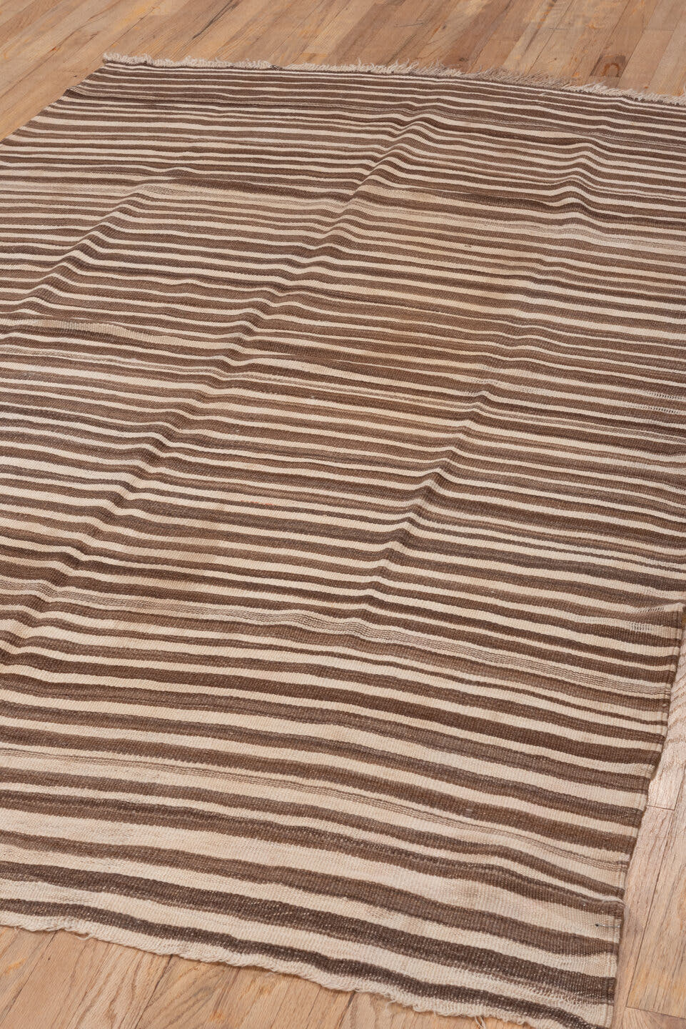 4' x 6' one-of-a-kind handmade vintage Blanket small size rug. Color palette: brown, ivory, taupe, camel, beige, gray