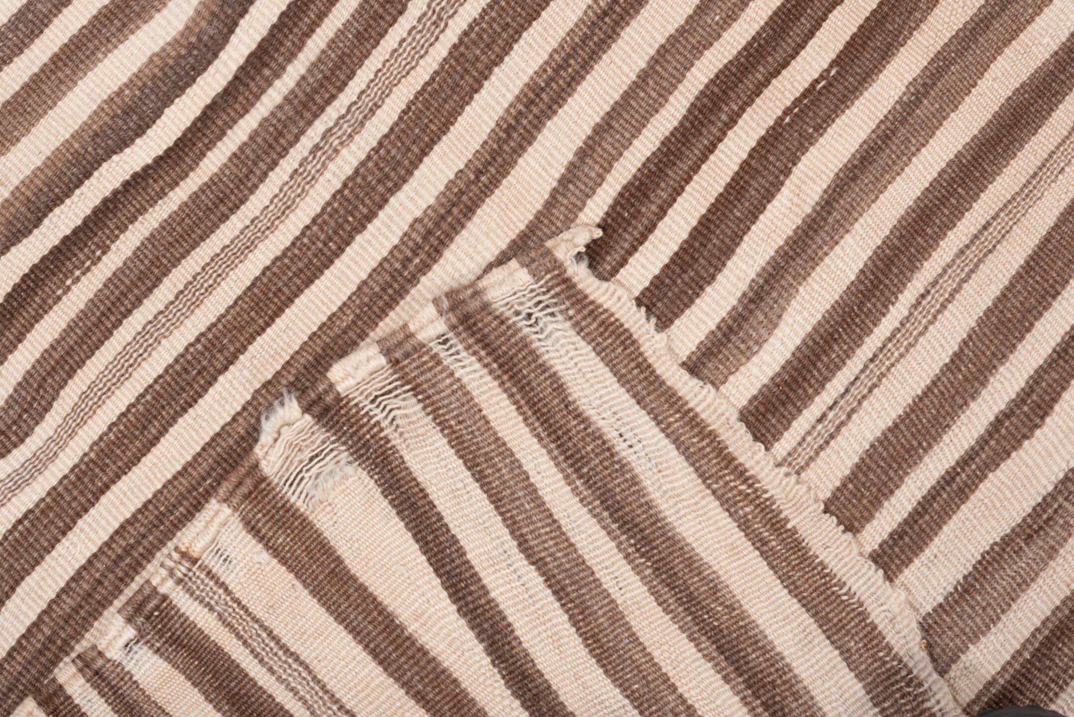 4' x 6' one-of-a-kind handmade vintage Blanket small size rug. Color palette: brown, ivory, taupe, camel, beige, gray