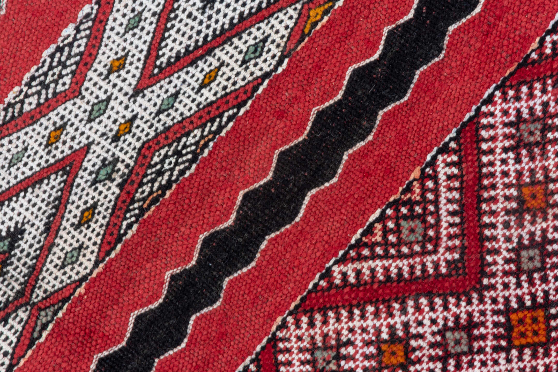 4' x 8' one-of-a-kind handmade vintage Kilim rug. Color palette: red, ivory, charcoal, rust, brown, gray, black, terracotta