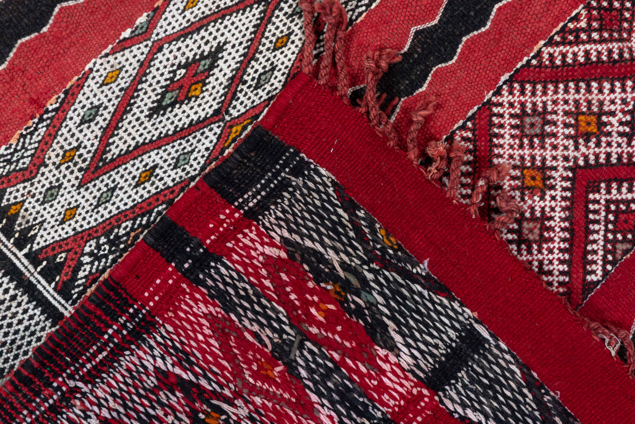 4' x 8' one-of-a-kind handmade vintage Kilim rug. Color palette: red, ivory, charcoal, rust, brown, gray, black, terracotta