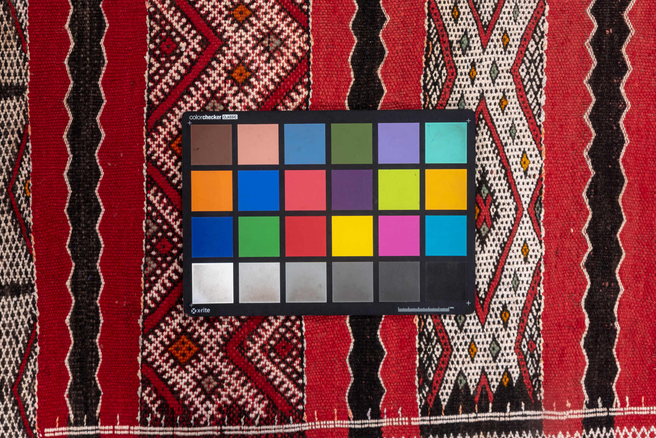 4' x 8' one-of-a-kind handmade vintage Kilim rug. Color palette: red, ivory, charcoal, rust, brown, gray, black, terracotta