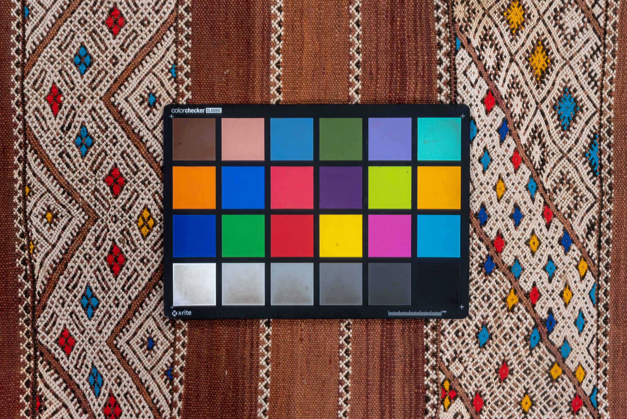 5' x 11' one-of-a-kind handmade vintage Kilim rug. Color palette: camel, ivory, indigo, rust, saffron, terra cotta, sky blue