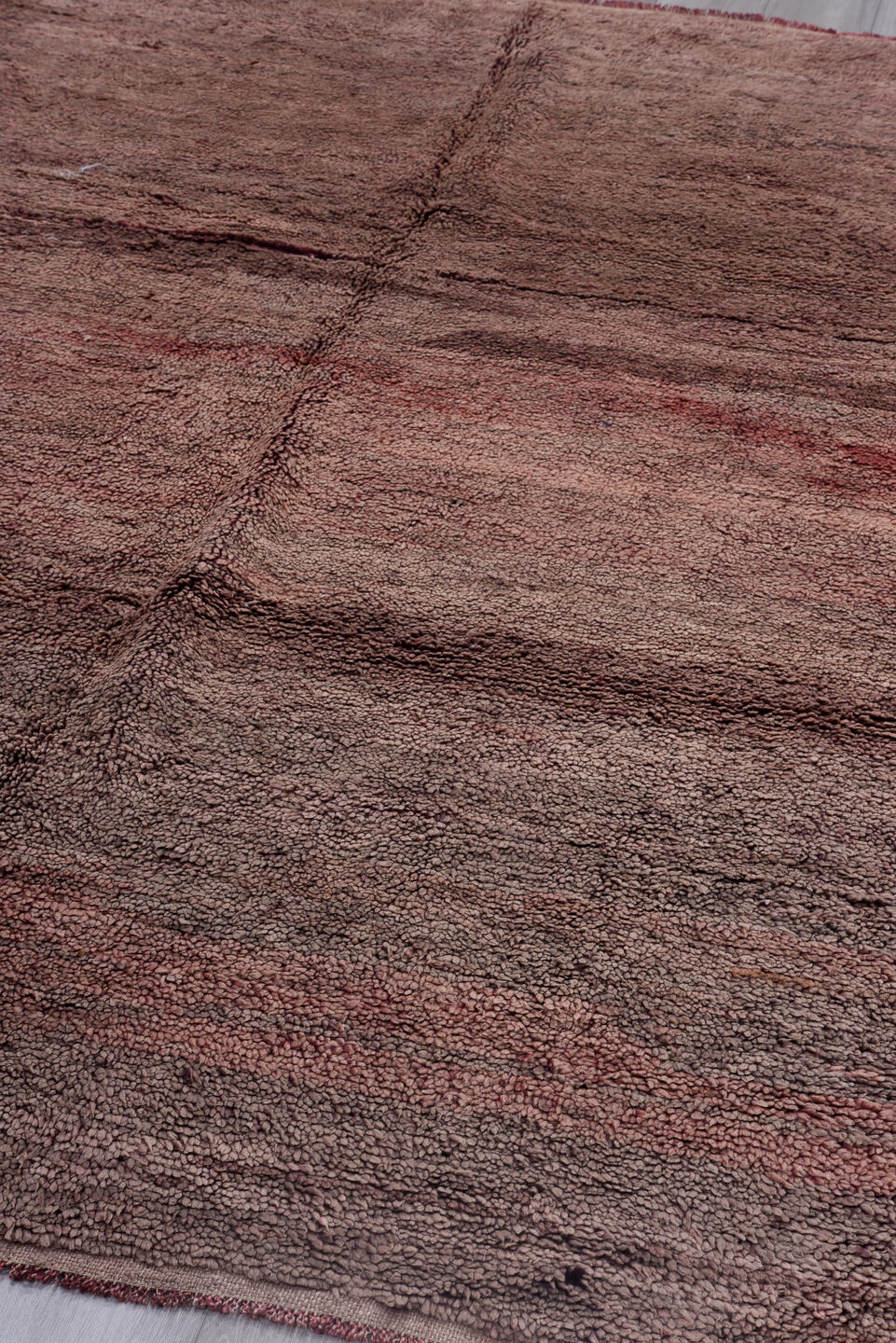 6' x 9' one-of-a-kind handmade vintage Moroccan medium size rug. Color palette: black, brown, gray, pink, red, redwood