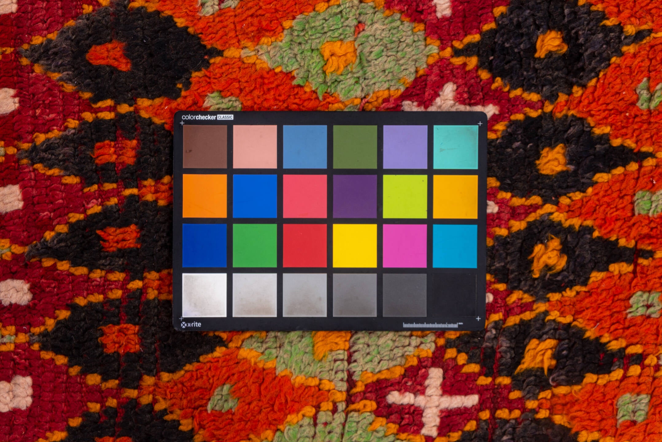 6' x 12' one-of-a-kind handmade vintage Moroccan large size rug. Color palette: brown, gray, off-white, orange, pink, red