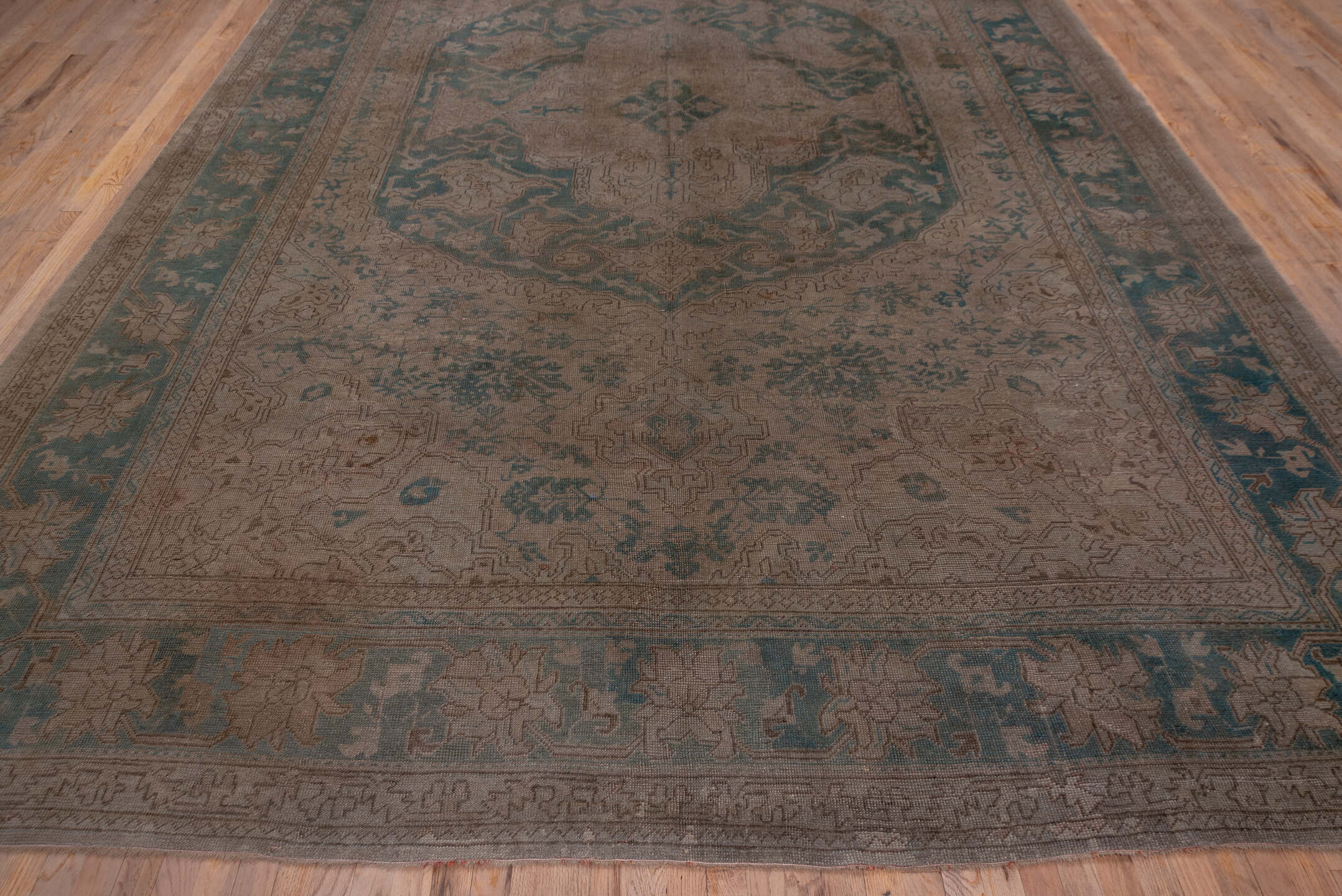 10' x 15' one-of-a-kind handmade antique Oushak rug. Color palette: taupe, dusty blue, beige, ivory, gray, camel, blue