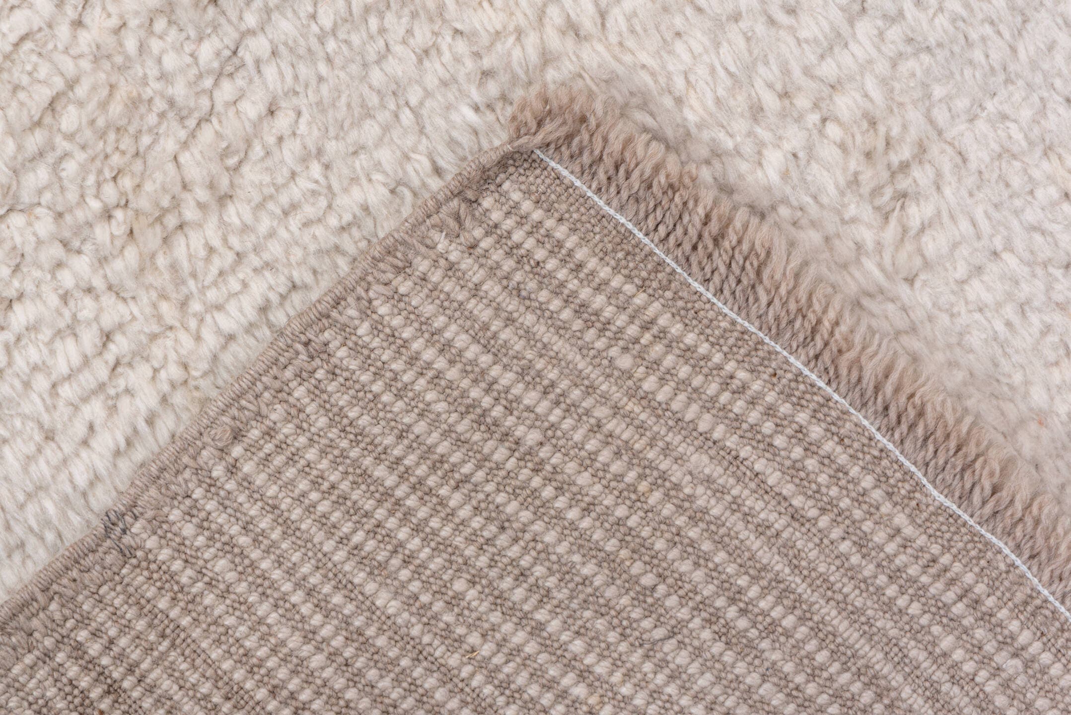 2' x 12' one-of-a-kind handmade vintage Moroccan runner rug. Color palette: ivory, cream, beige