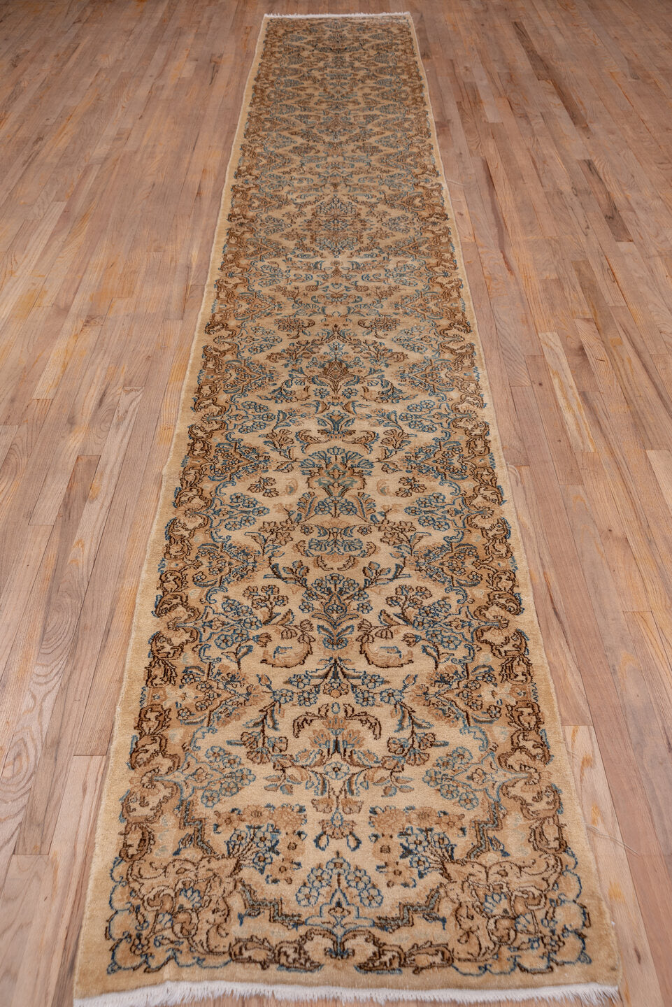 2' x 17' one-of-a-kind handmade vintage Kerman runner rug. Color palette: brown, gray, off-white, orange, snow, white