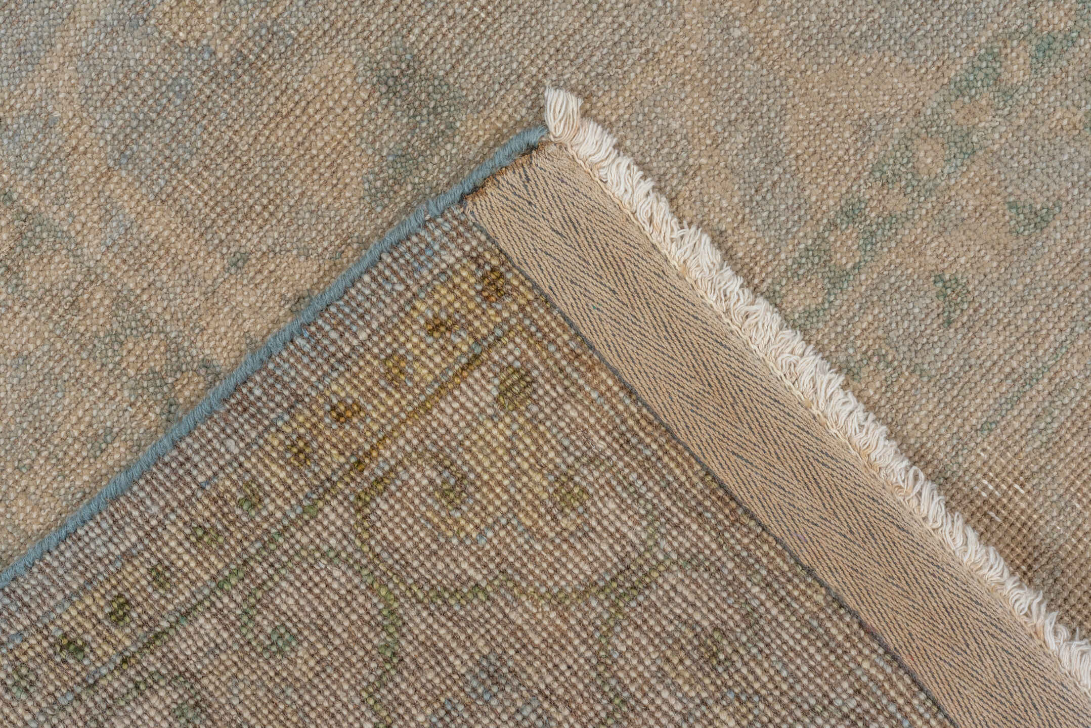 5' x 7' one-of-a-kind handmade vintage Khotan rug. Color palette: beige, ivory, pale blue, taupe, sage, light blue, gray