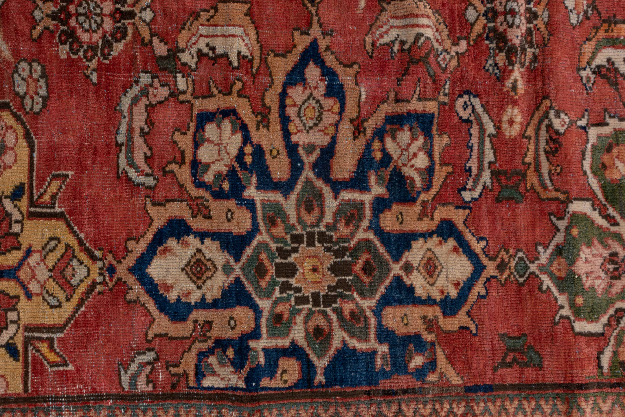 11' x 19' one-of-a-kind handmade antique Sultanabad oversize rug. Color palette: terra cotta, brown, ivory, gold, navy, sage
