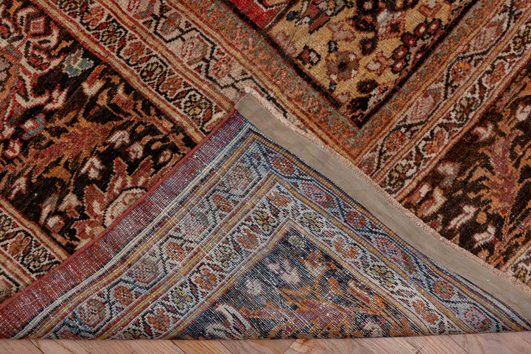 11' x 19' one-of-a-kind handmade antique Sultanabad oversize rug. Color palette: terra cotta, brown, ivory, gold, navy, sage