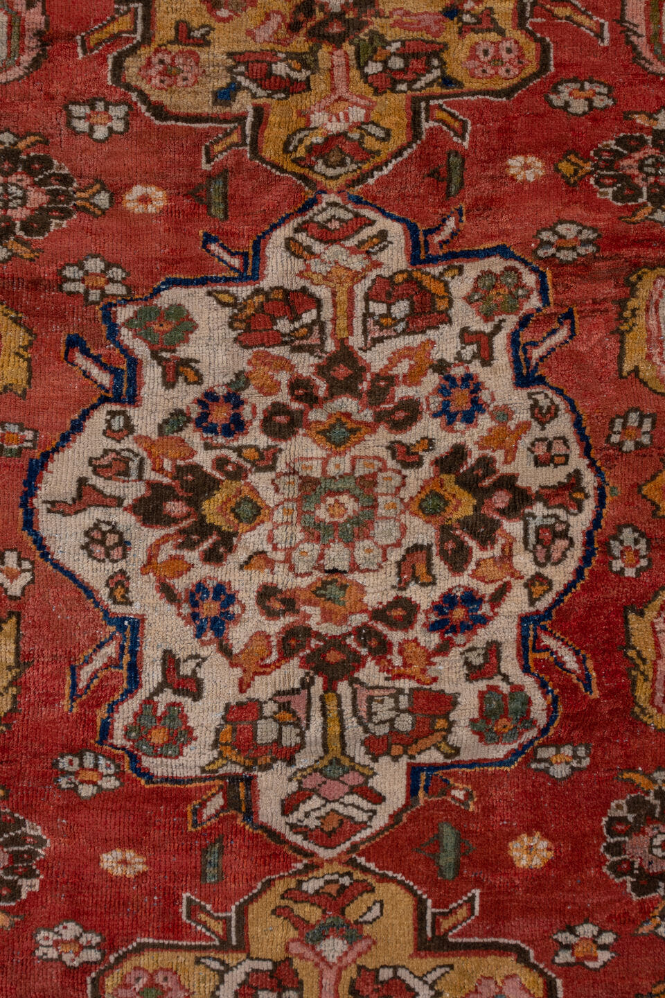 11' x 19' one-of-a-kind handmade antique Sultanabad oversize rug. Color palette: terra cotta, brown, ivory, gold, navy, sage