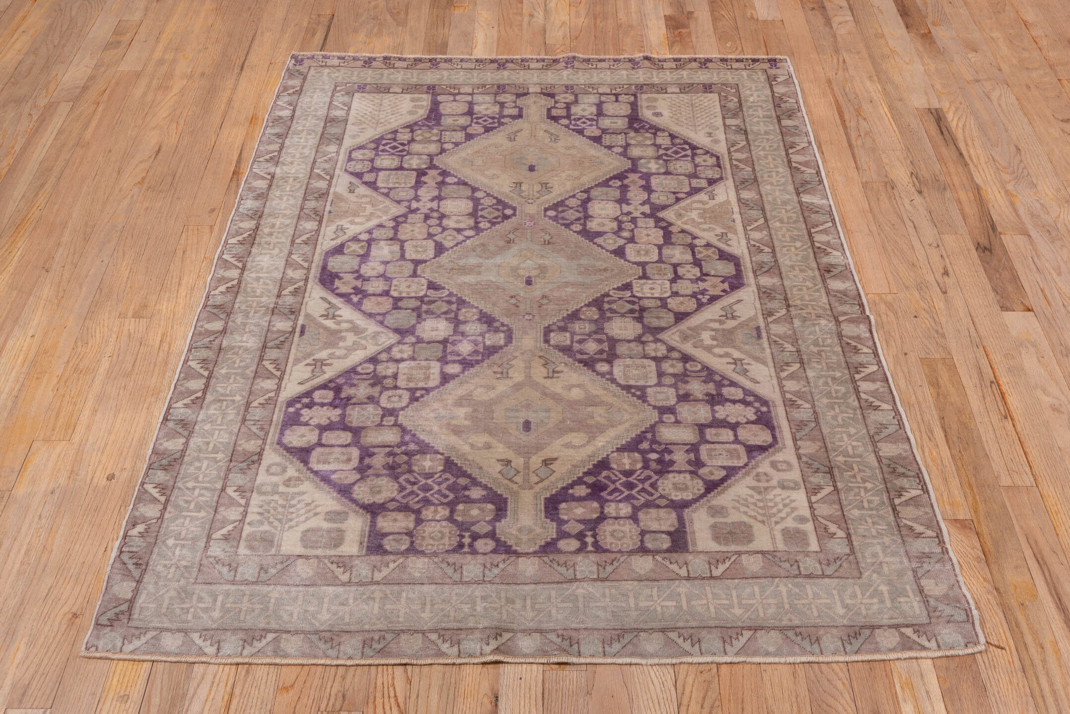 3' x 5' one-of-a-kind handmade vintage Sivas small size rug. Color palette: brown, gray, light gray, off-white, orange, pink