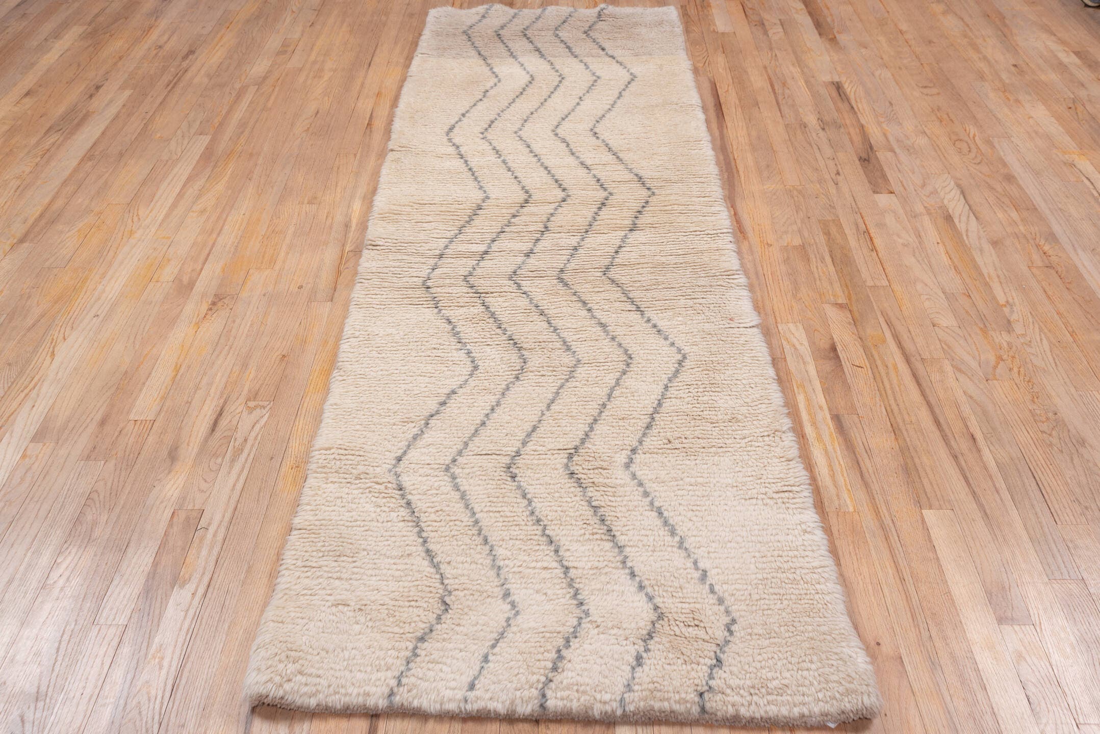 3' x 9' one-of-a-kind handmade vintage Moroccan runner rug. Color palette: ivory, gray, cream