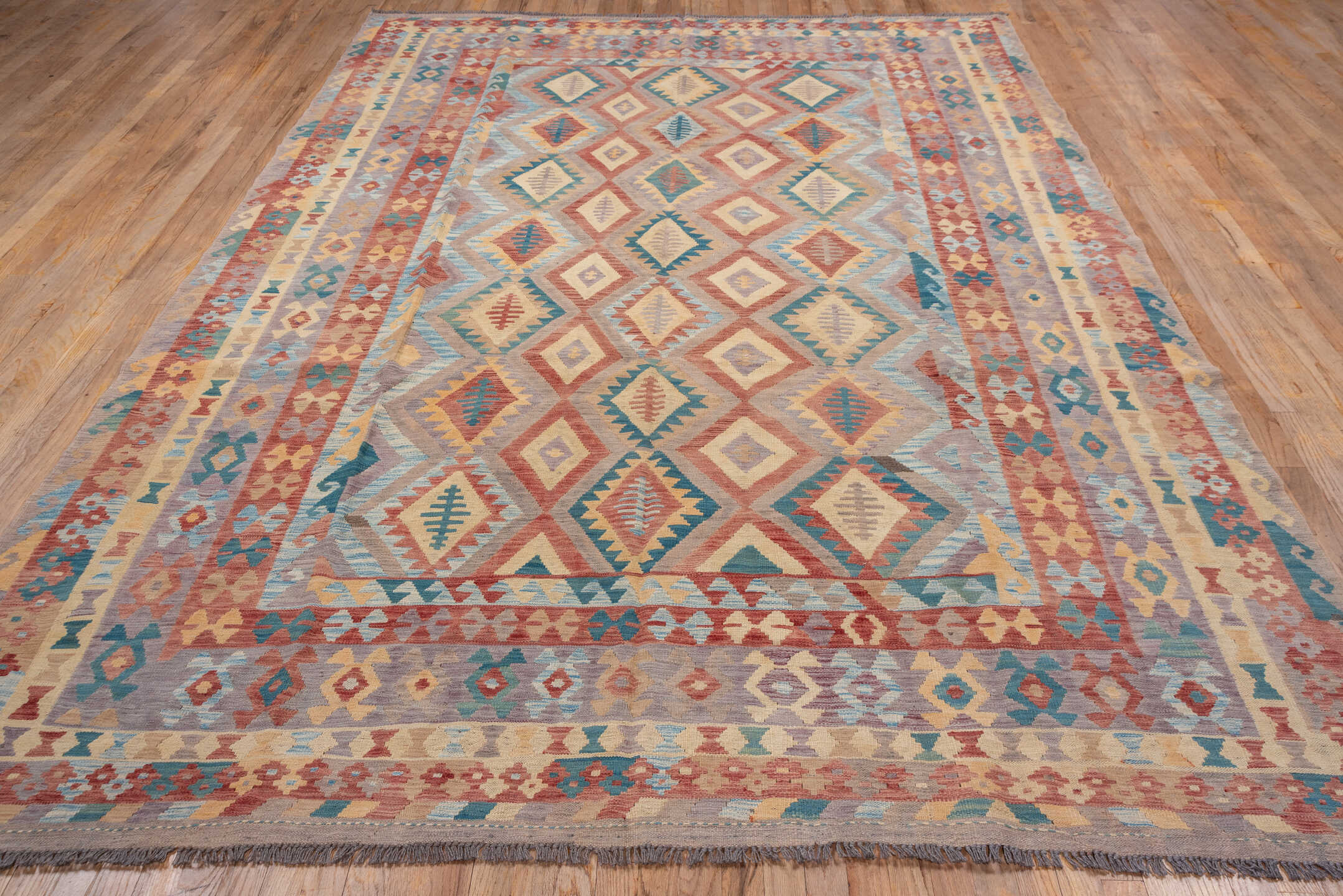 8' x 11' one-of-a-kind handmade vintage Kilim large size rug. Color palette: rose, ivory, dusty blue, terra cotta, taupe