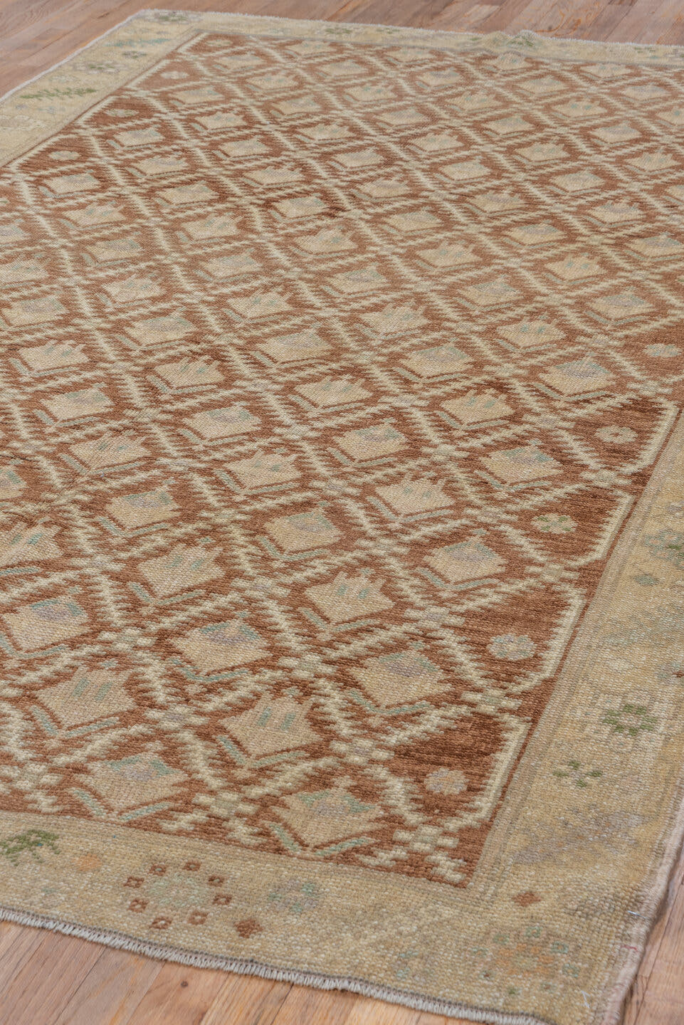 5' x 8' one-of-a-kind handmade vintage Oushak medium size rug. Color palette: brown, ivory, beige, sage, taupe, camel, green