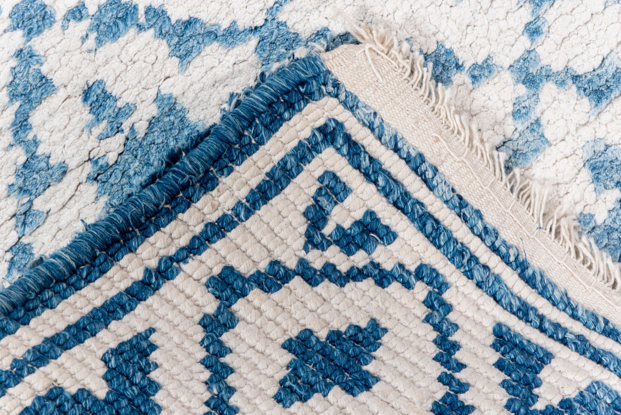 5' x 9' one-of-a-kind handmade vintage Cotton Agra medium size rug. Color palette: ivory, sky blue, powder blue, light blue