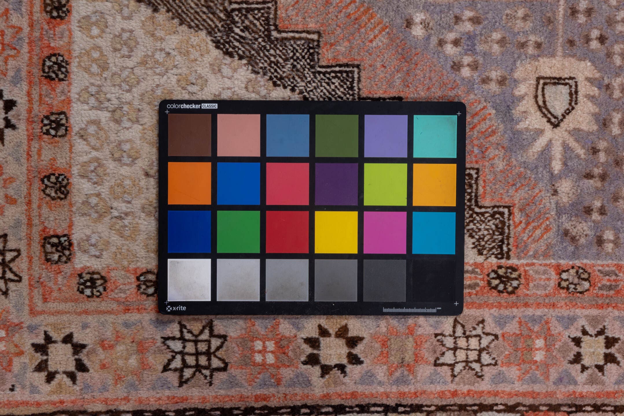 5' x 10' one-of-a-kind handmade vintage Khotan medium size rug. Color palette: rose, taupe, lavender, terra cotta, ivory