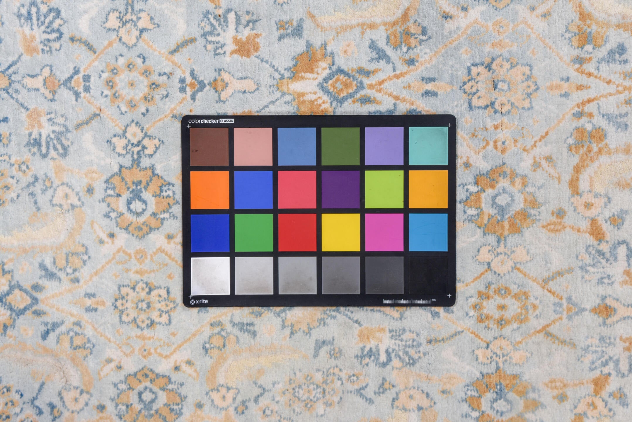 9' x 17' one-of-a-kind handmade vintage Agra rug. Color palette: blue, brown, dark gray, gray, light gray, off-white, orange