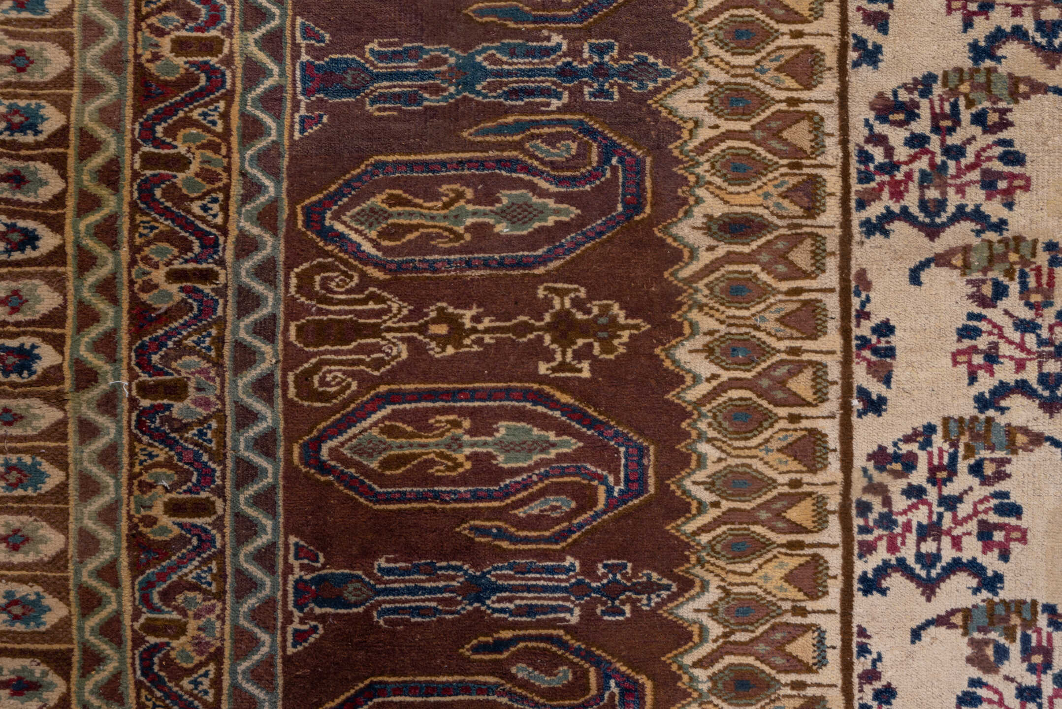 9' x 24' one-of-a-kind handmade vintage Amritzar rug. Color palette: ivory, brown, navy, taupe, rust, gold, blue, beige