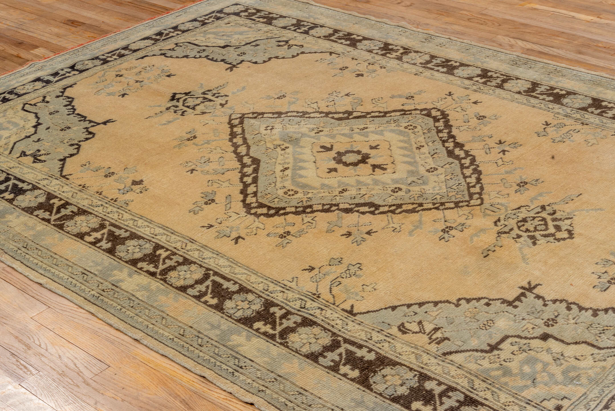 6' x 9' one-of-a-kind handmade vintage Oushak medium size rug. Color palette: ivory, pale blue, brown, taupe, cream