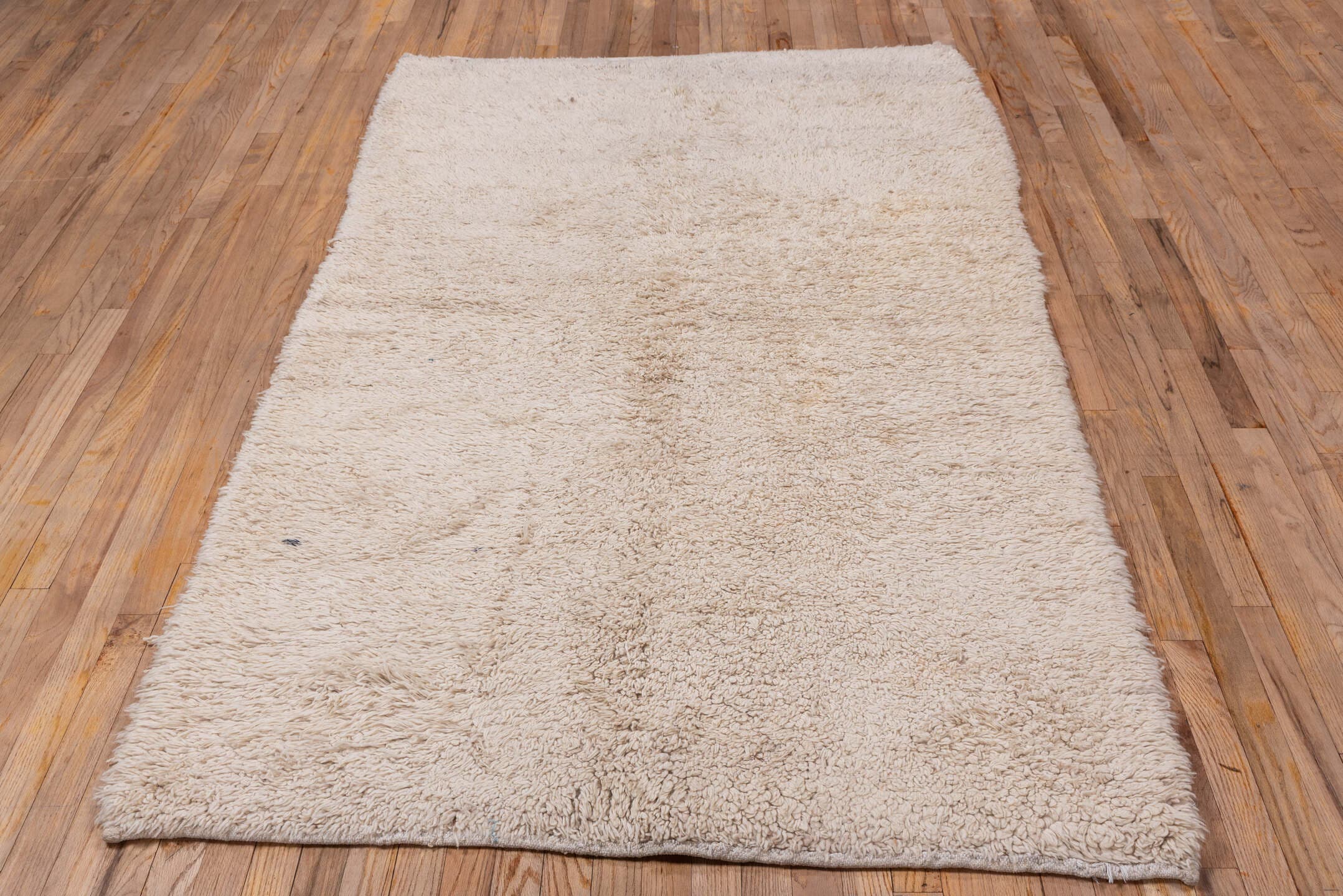 4' x 7' one-of-a-kind handmade vintage Tulu rug. Color palette: ivory, cream, beige, taupe, gray