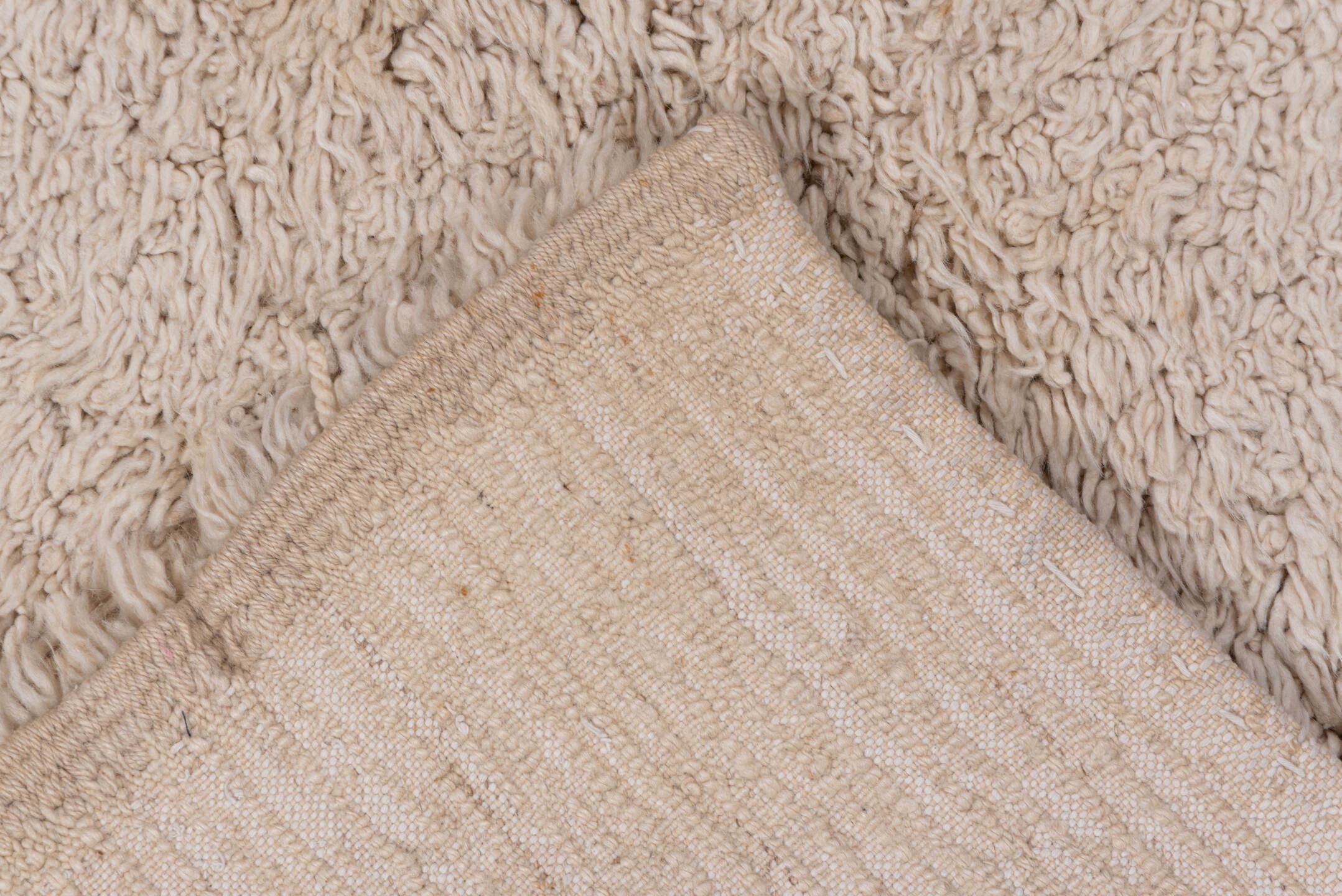 4' x 7' one-of-a-kind handmade vintage Tulu rug. Color palette: ivory, cream, beige, taupe, gray