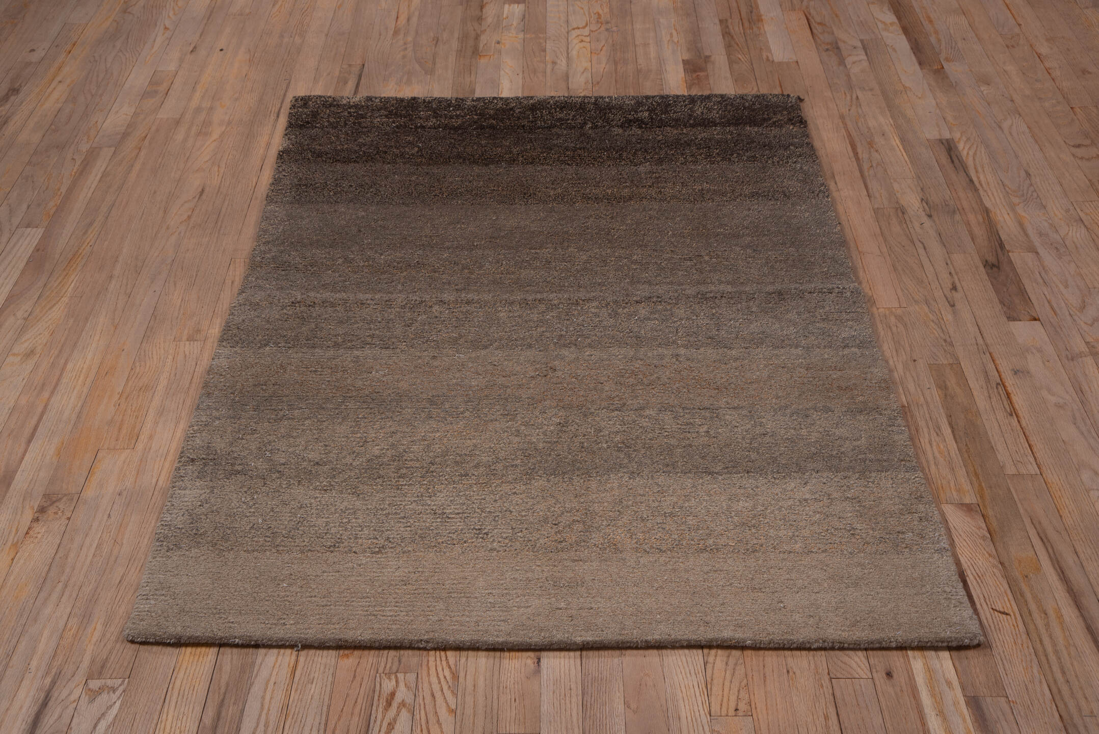 4' x 5' one-of-a-kind handmade vintage Tibetan small size rug. Color palette: taupe, mocha, charcoal, brown, mushroom, stone